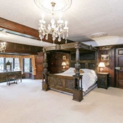 Oak panelled bedroom